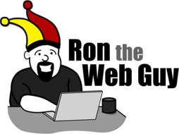 Ron the Web Guy at desk with laptop